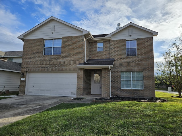 front of property with a front yard and a garage