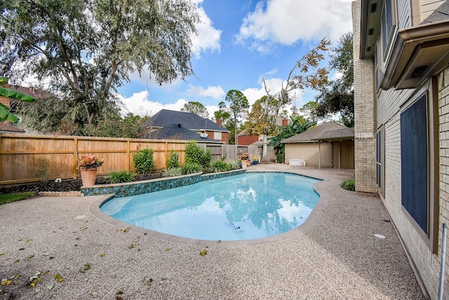 view of pool featuring a patio