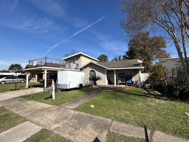 bungalow-style home with a carport and a front yard