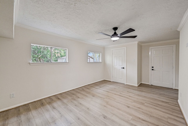 unfurnished room with a textured ceiling, light hardwood / wood-style flooring, ceiling fan, and crown molding