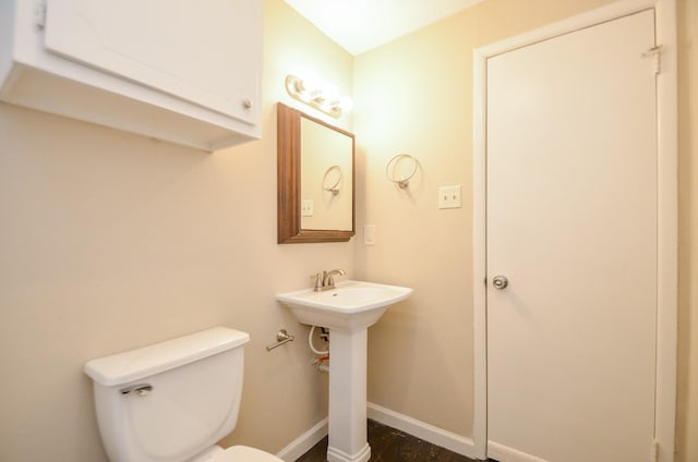 bathroom with sink and toilet