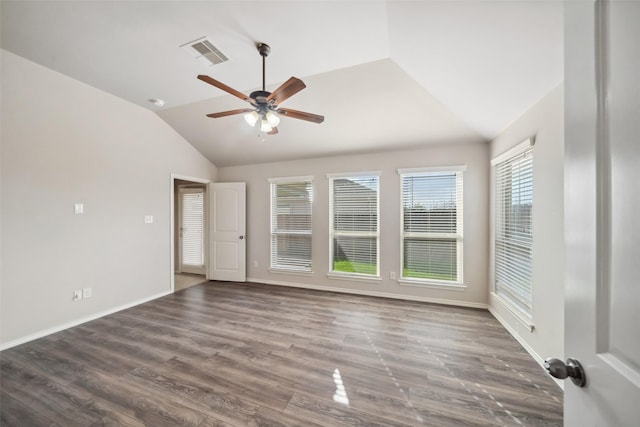 unfurnished room featuring lofted ceiling, ceiling fan, and dark hardwood / wood-style floors