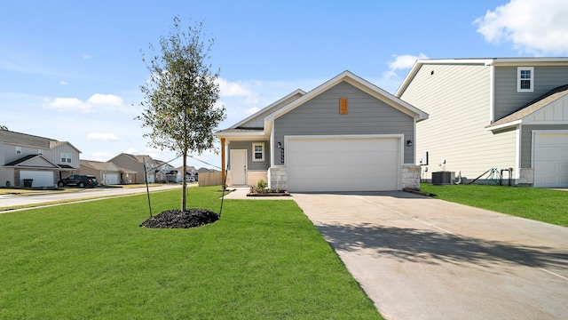 view of front of property with central AC and a front lawn