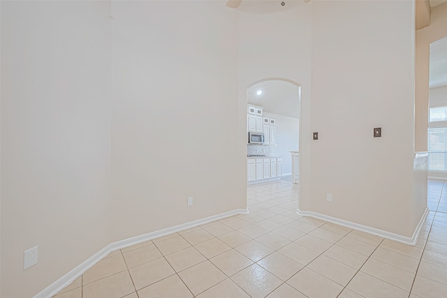 spare room with light tile patterned floors