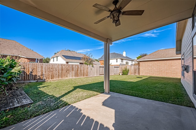 view of patio featuring ceiling fan