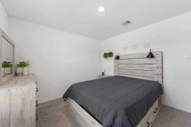 carpeted bedroom with visible vents