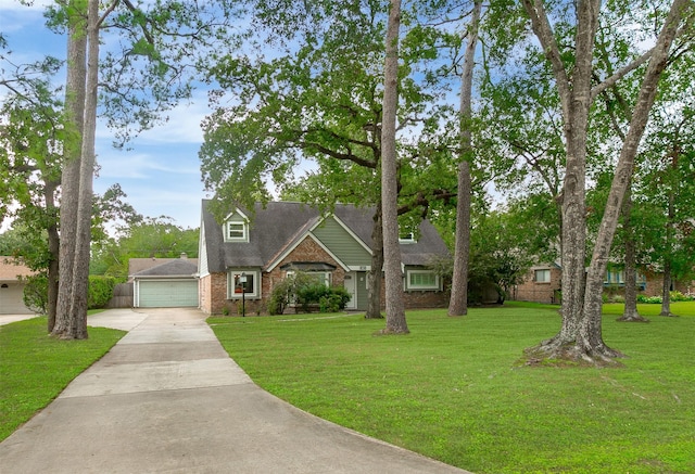 view of front of property with a garage and a front lawn