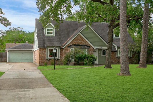 view of front facade with a front lawn and a garage