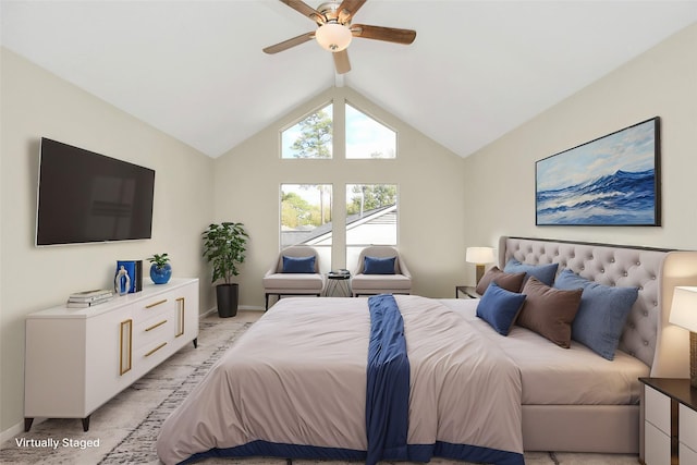 bedroom featuring lofted ceiling, light colored carpet, and ceiling fan