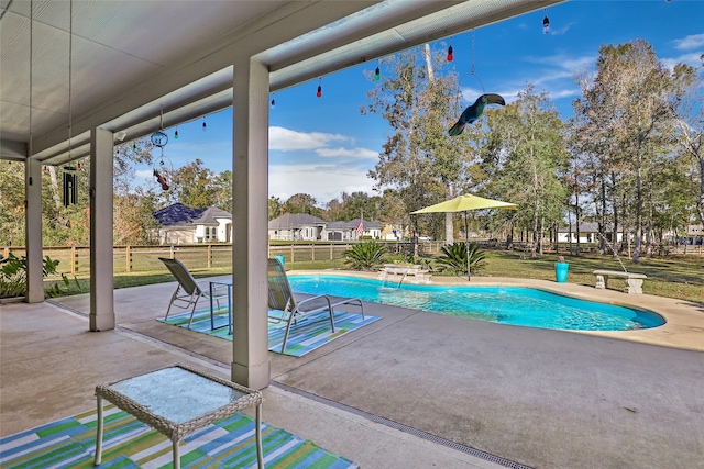 view of pool featuring a patio area