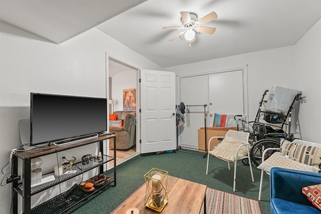 sitting room with ceiling fan and carpet floors