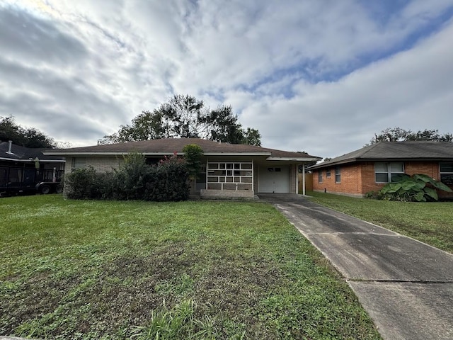 single story home featuring a front yard and a garage