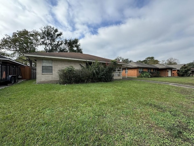 exterior space with a front yard