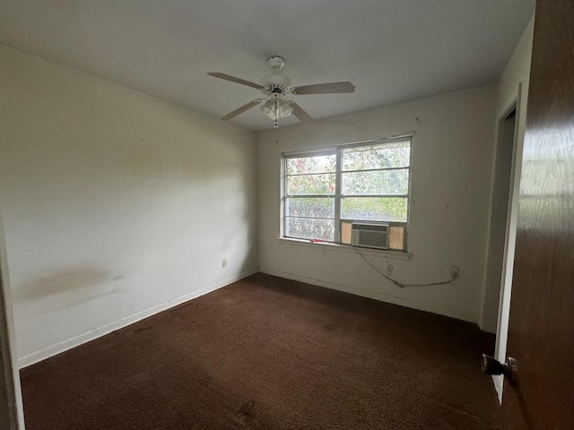 carpeted spare room with ceiling fan and cooling unit