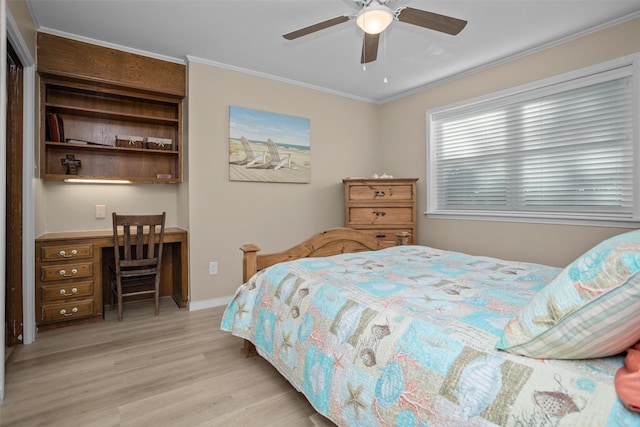 bedroom featuring ceiling fan, light hardwood / wood-style flooring, and ornamental molding