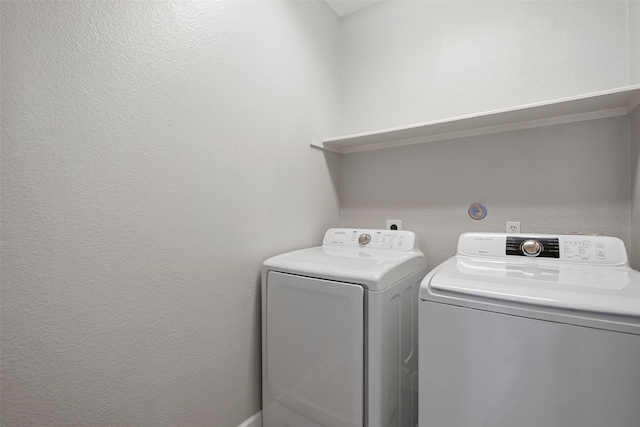 laundry room with independent washer and dryer