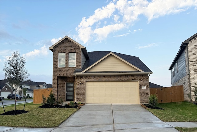 view of front of home with a front lawn and a garage