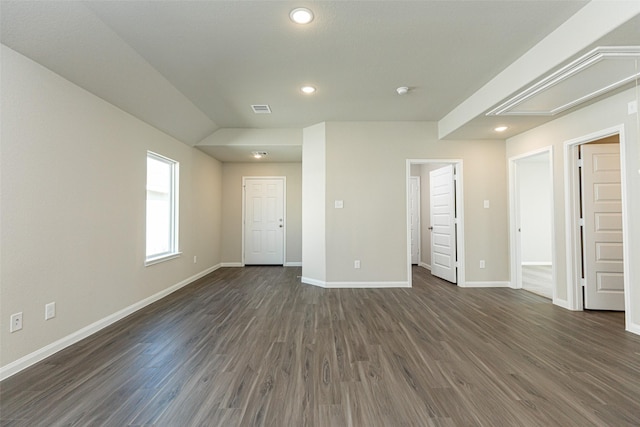 unfurnished bedroom featuring dark hardwood / wood-style floors