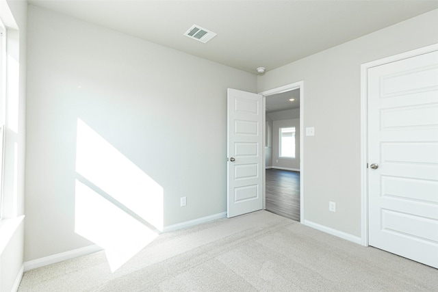 view of carpeted spare room