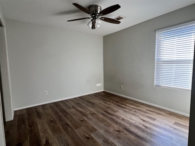 unfurnished room with hardwood / wood-style flooring and ceiling fan