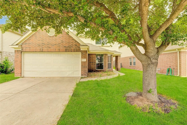 view of front of home with a garage and a front yard