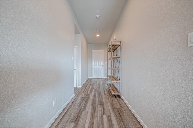 hall featuring light hardwood / wood-style floors