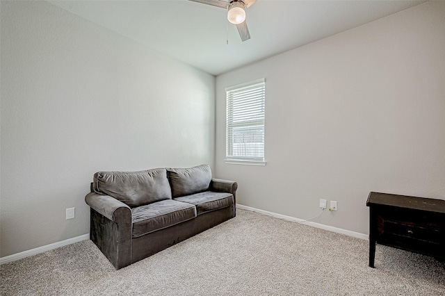 living room with carpet floors and ceiling fan