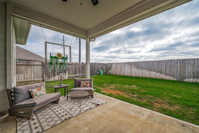 view of patio featuring ceiling fan