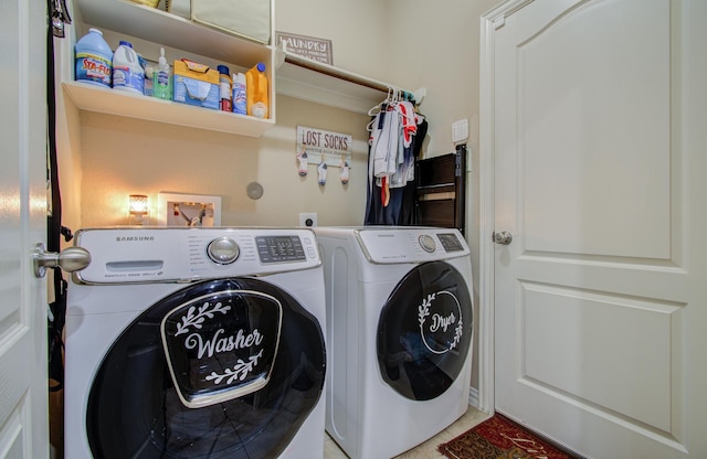 laundry room featuring separate washer and dryer