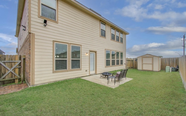 rear view of property with a patio, a storage unit, and a lawn