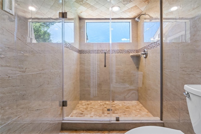 bathroom with an enclosed shower