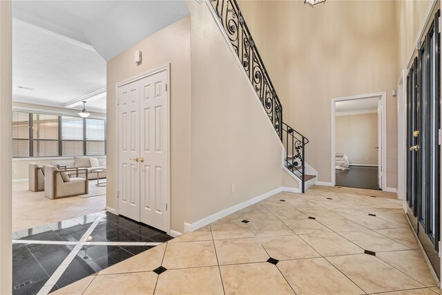 entryway with tile patterned floors