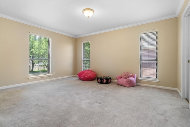 game room with crown molding, plenty of natural light, and carpet floors