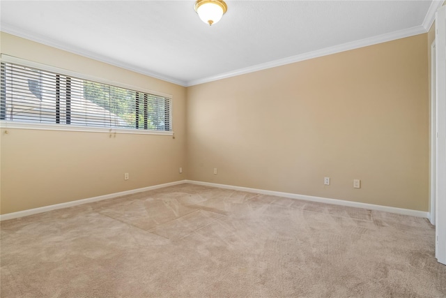 spare room with light carpet and ornamental molding