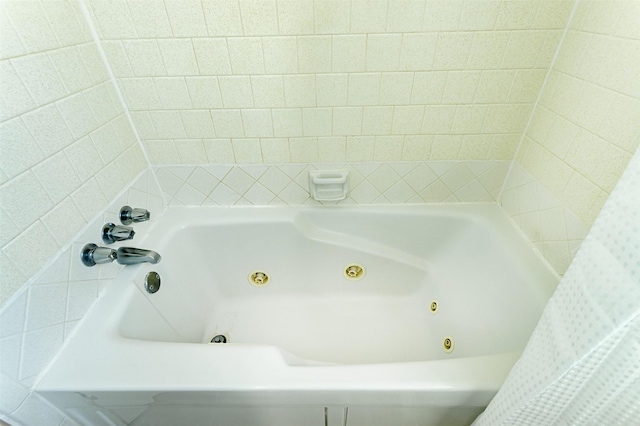 bathroom featuring a tub