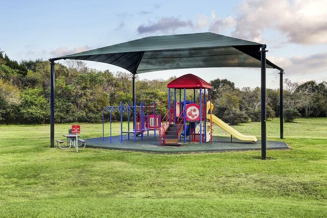 view of jungle gym with a yard