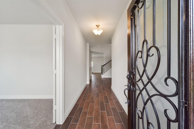 hall featuring dark wood-type flooring