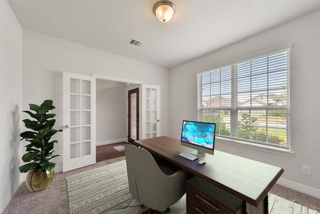 office featuring french doors and carpet