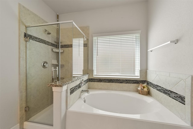 bathroom featuring plus walk in shower