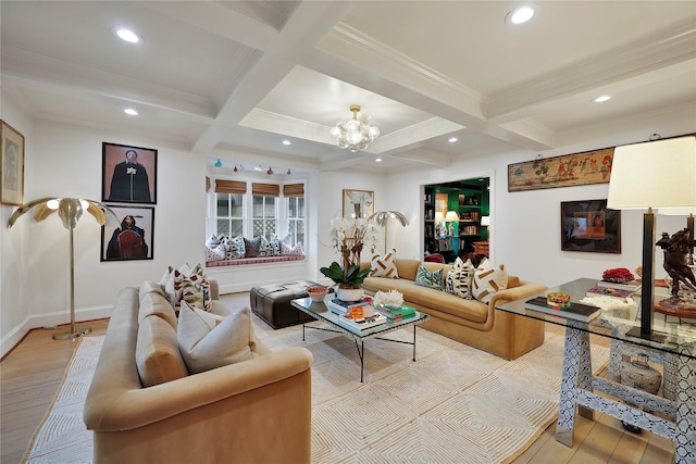 living room with a notable chandelier, beam ceiling, light wood-type flooring, and coffered ceiling