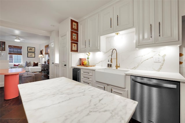 kitchen featuring white cabinets, sink, stainless steel dishwasher, ceiling fan, and beverage cooler