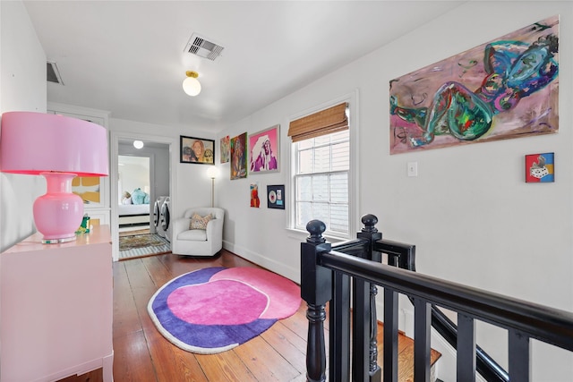 bedroom with dark wood-type flooring