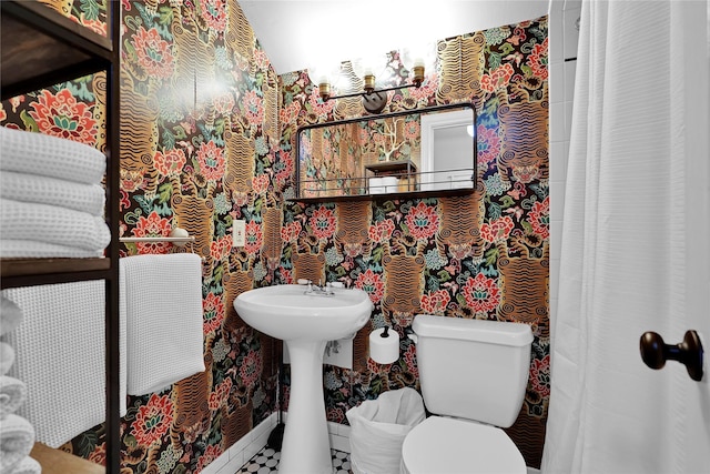 bathroom featuring toilet