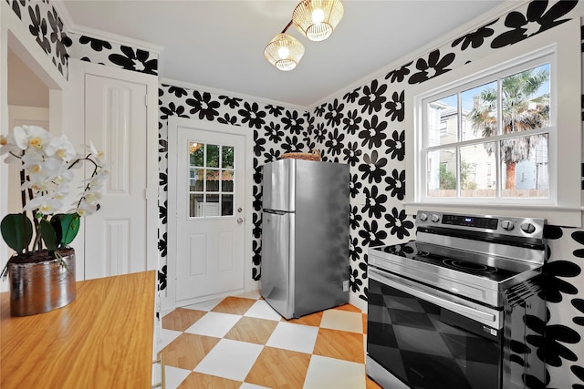 kitchen featuring crown molding and stainless steel appliances