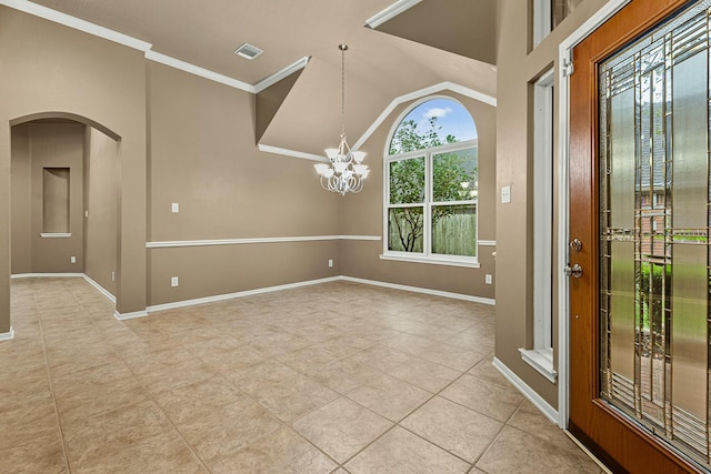 unfurnished room featuring vaulted ceiling, an inviting chandelier, crown molding, and light tile patterned flooring