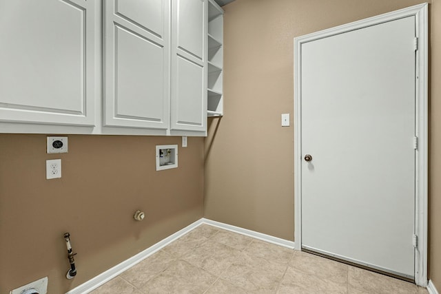 laundry room featuring electric dryer hookup, cabinets, hookup for a gas dryer, hookup for a washing machine, and light tile patterned floors