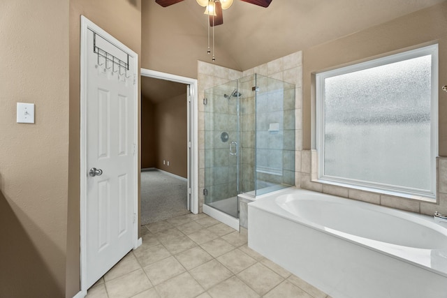 bathroom featuring plus walk in shower, tile patterned floors, ceiling fan, and lofted ceiling