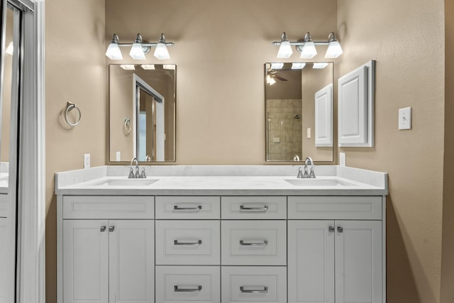 bathroom featuring ceiling fan and vanity