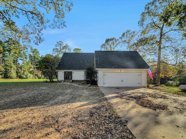 exterior space with a garage