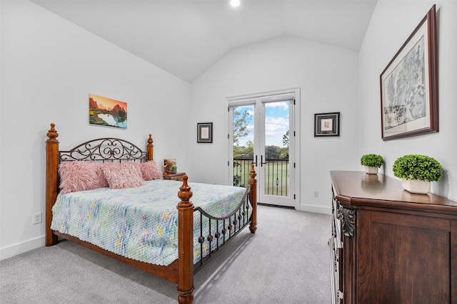 bedroom with light colored carpet, lofted ceiling, access to outside, and french doors